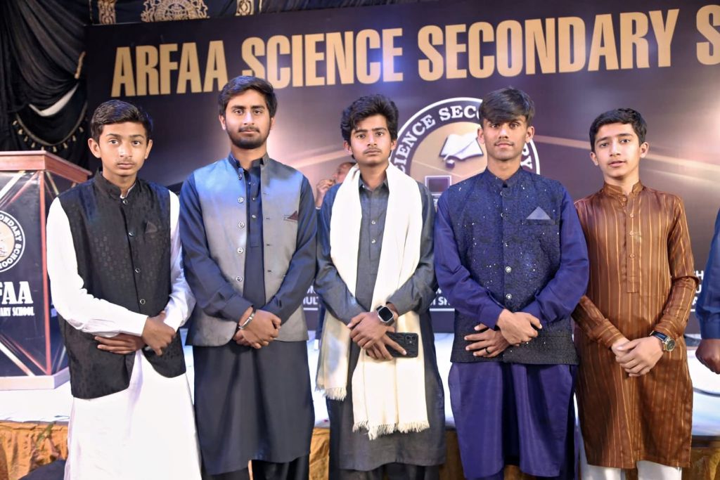 Top achievers on stage at the annual function